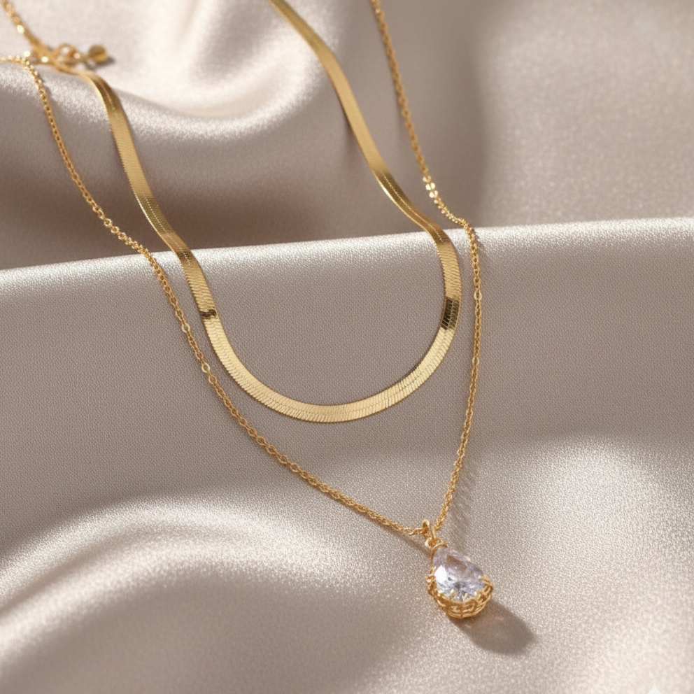 Collier double rangée pendentif goutte d’eau