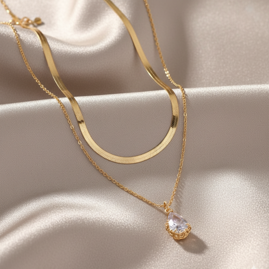 Collier double rangée pendentif goutte d’eau